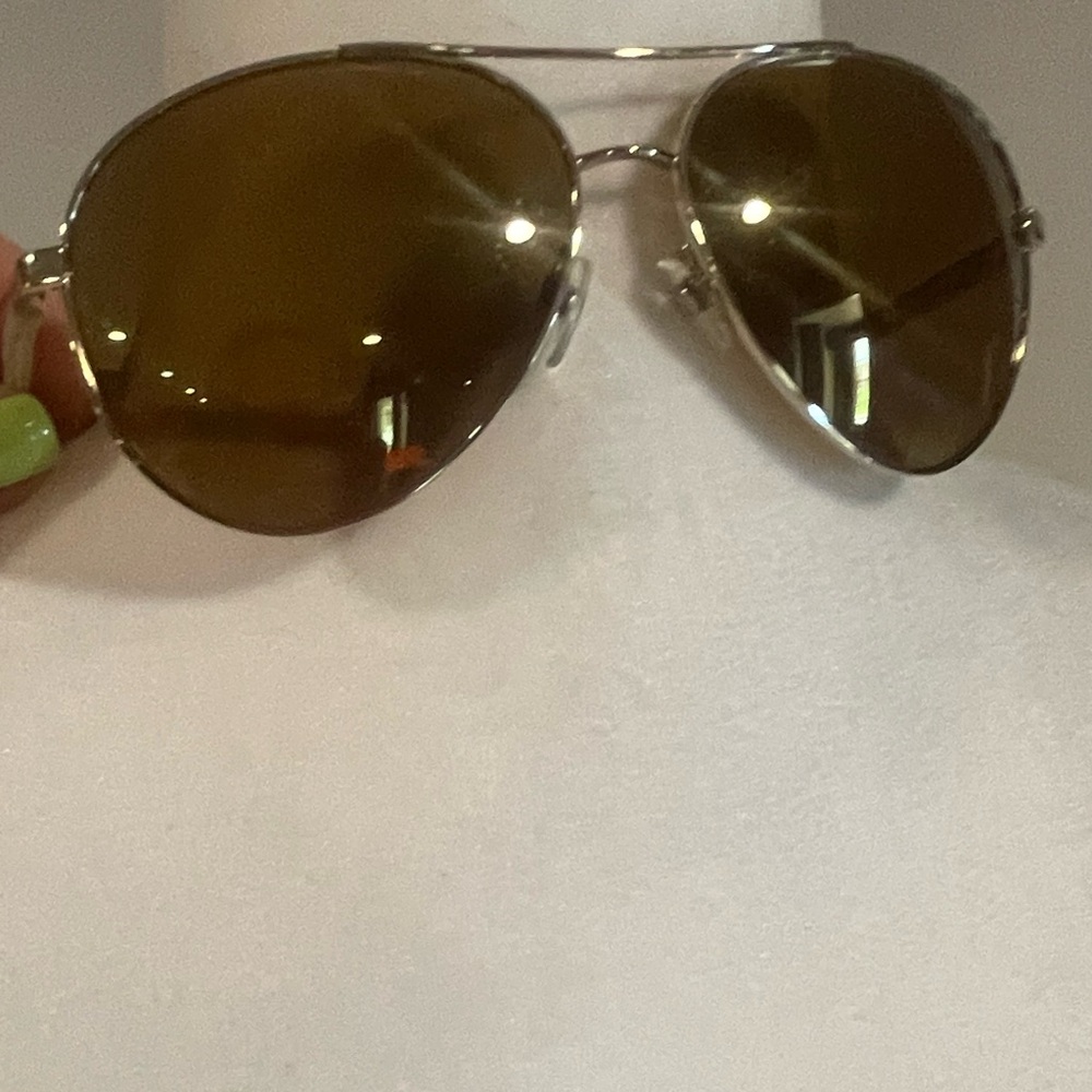 Authentic Chanel sunglasses.  Worn. But, still good condition.